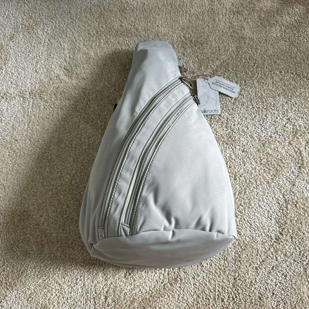 Grey Sling bag with decorative strap